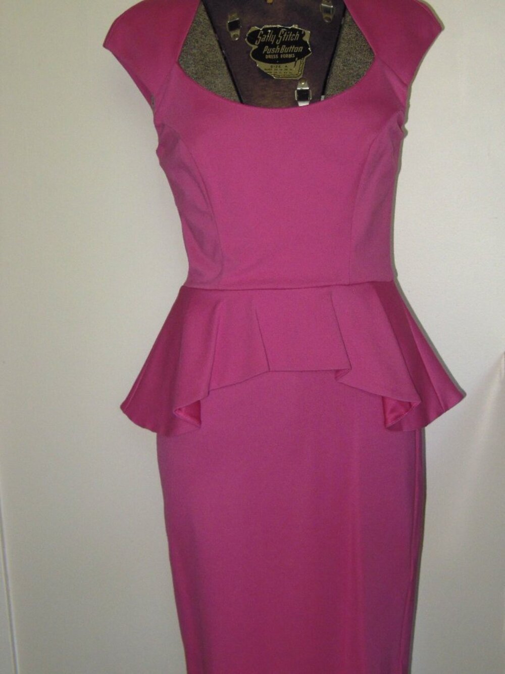 Pink Mariah peplum dress by Bebe Size Small Flared Ruffle